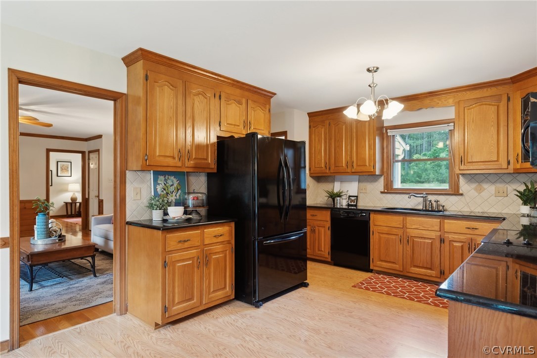 13200 River Road Chesterfield, VA 23838 - Photo 11 of 50 a kitchen with granite countertop stainless steel appliances a refrigerator stove and sink