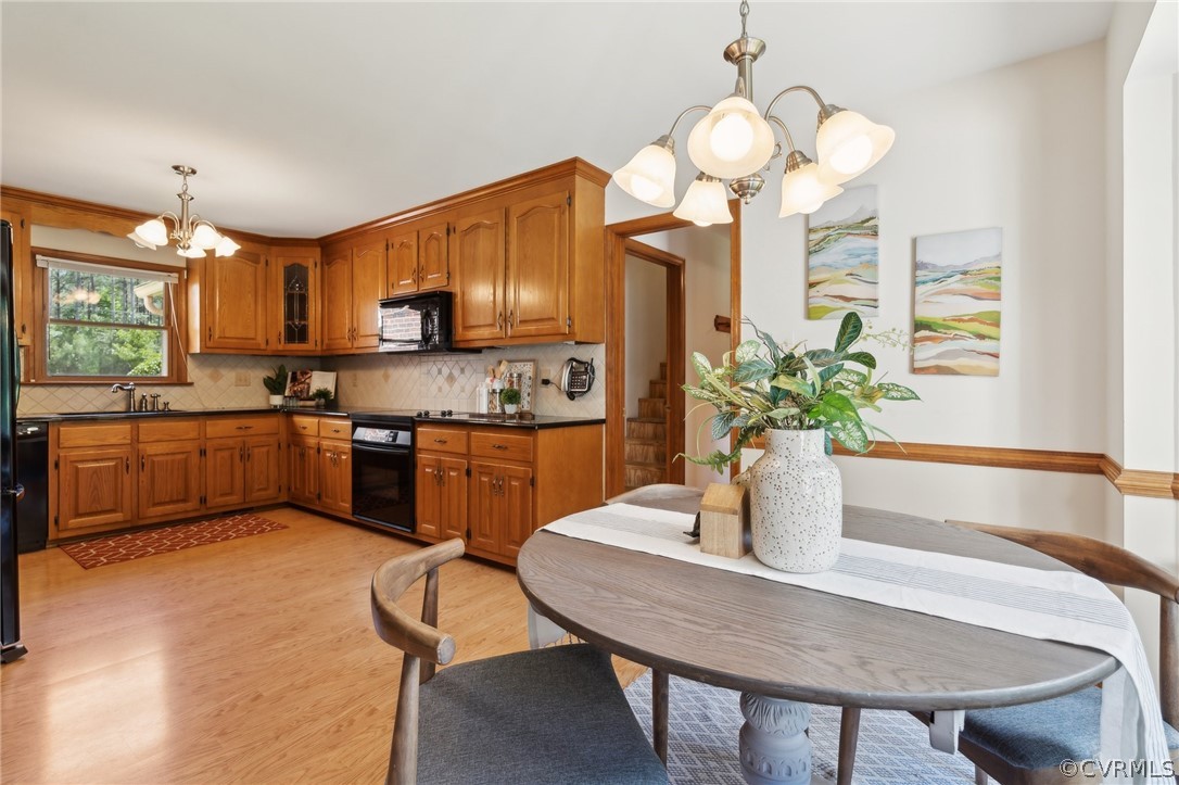 13200 River Road Chesterfield, VA 23838 - Photo 15 of 50 a kitchen with a table chairs and microwave