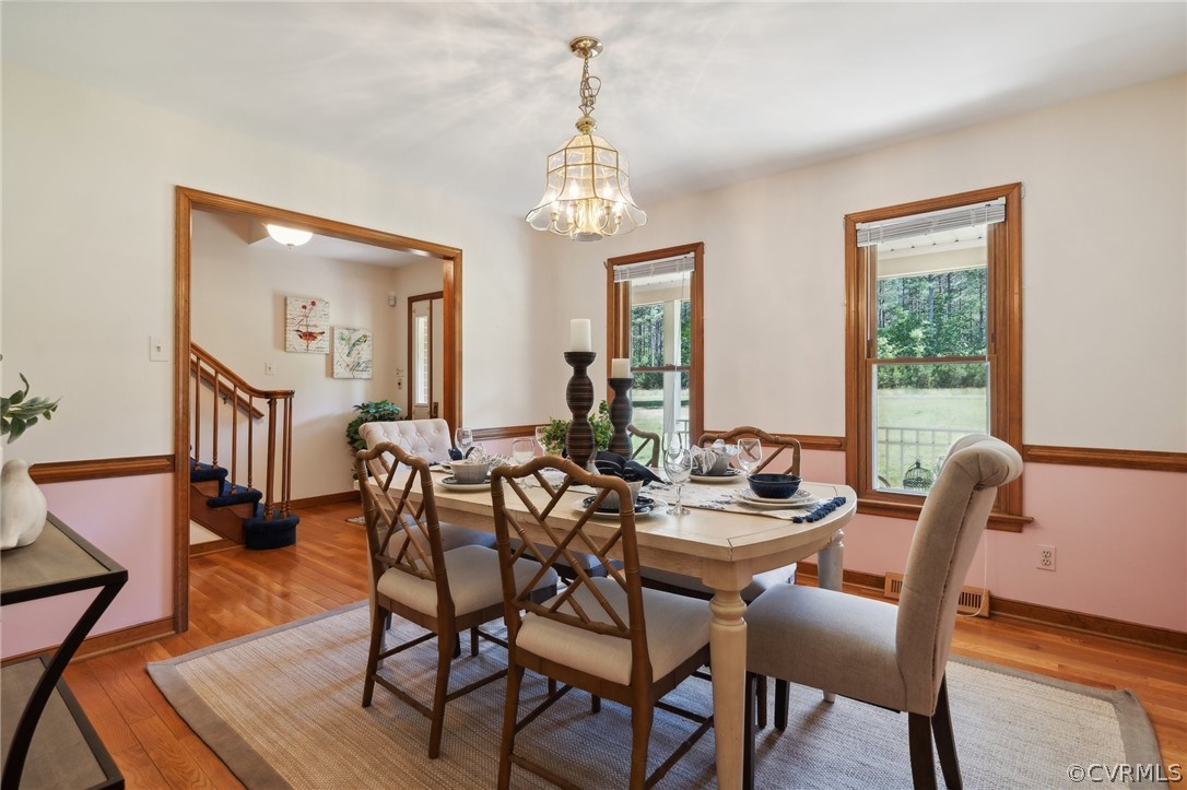 13200 River Road Chesterfield, VA 23838 - Photo 19 of 50 a view of a dining room with furniture window and wooden floor