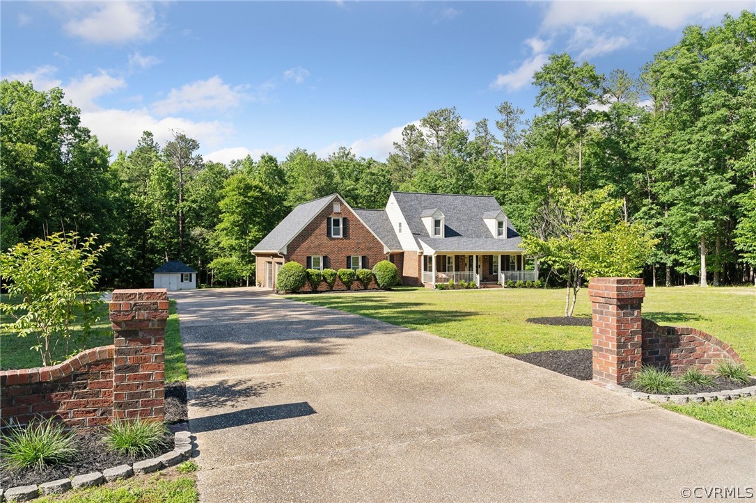 13200 River Road Chesterfield, VA 23838 - Photo 2 of 50 a front view of a house with garden