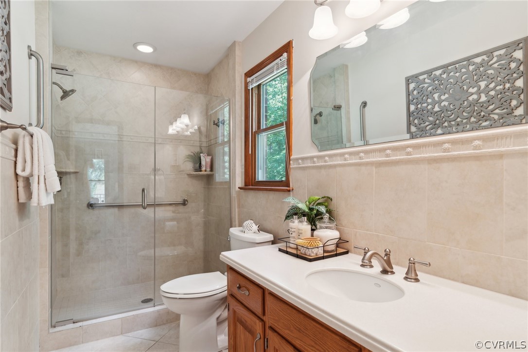 13200 River Road Chesterfield, VA 23838 - Photo 27 of 50 a bathroom with a sink toilet and shower