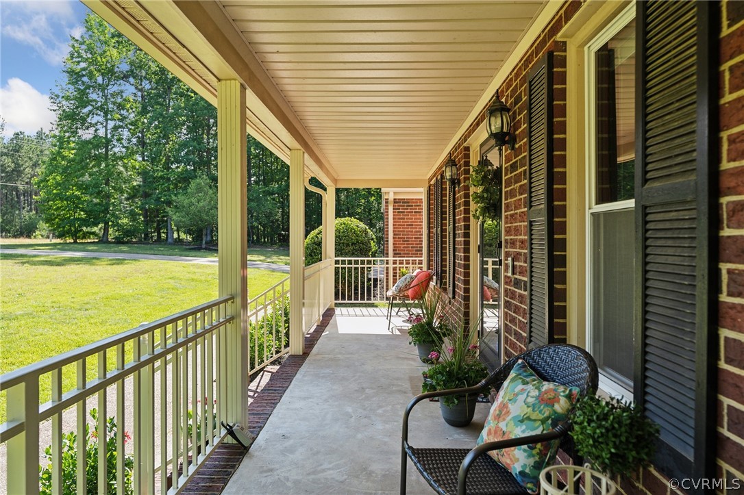 13200 River Road Chesterfield, VA 23838 - Photo 3 of 50 a balcony with chairs