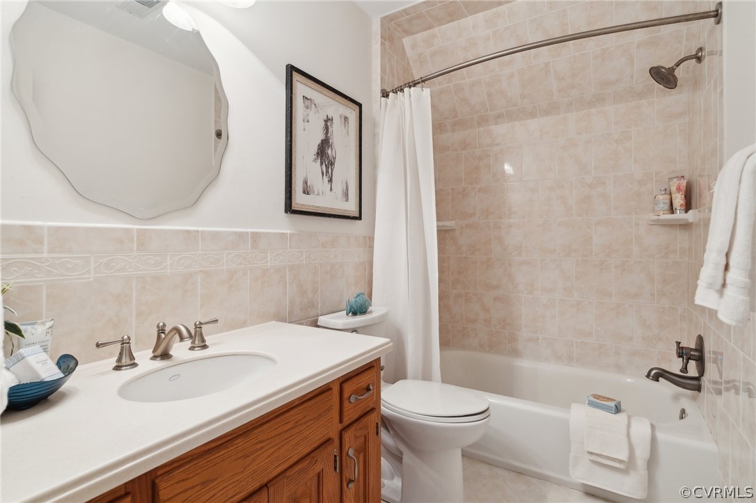 13200 River Road Chesterfield, VA 23838 - Photo 31 of 50 a bathroom with a sink toilet and shower