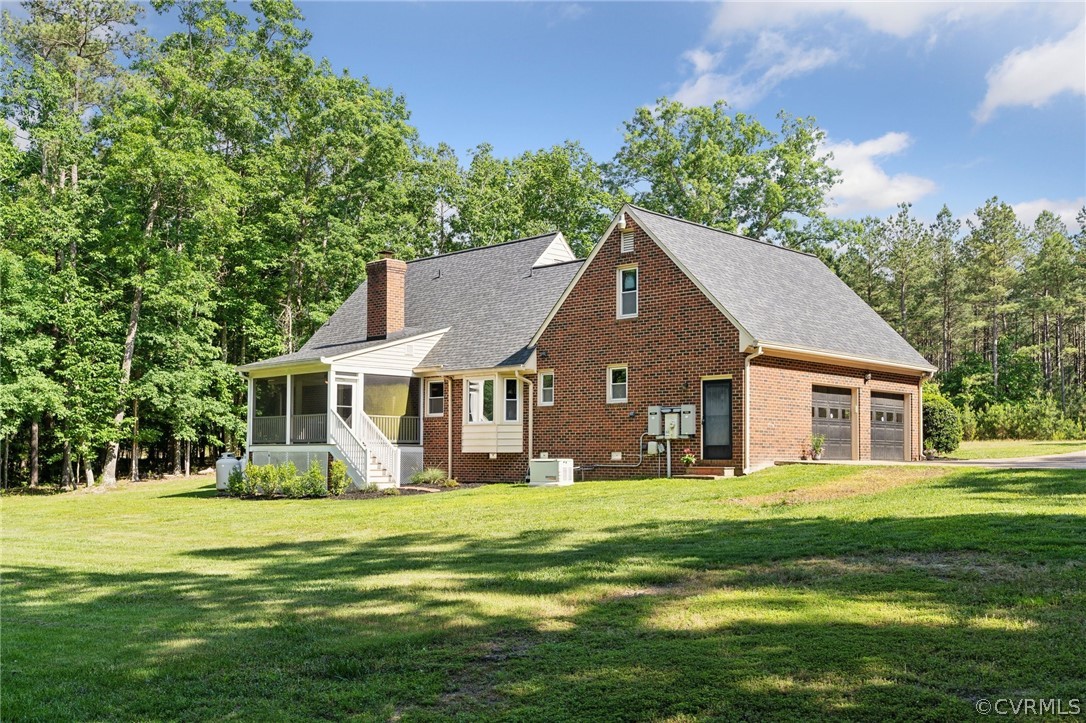 13200 River Road Chesterfield, VA 23838 - Photo 40 of 50 a front view of a house with a yard