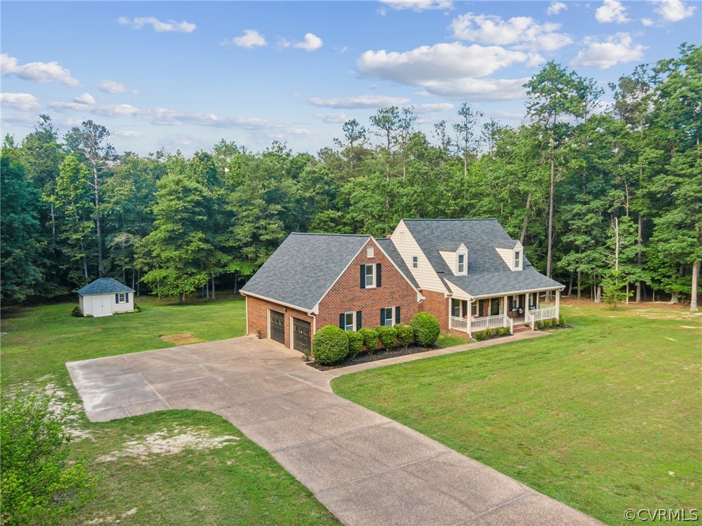 13200 River Road Chesterfield, VA 23838 - Photo 42 of 50 a aerial view of a house with a yard table and chairs