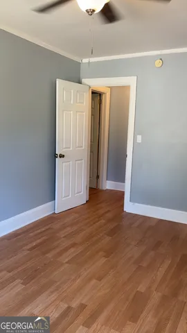 a view of a livingroom with wooden floor