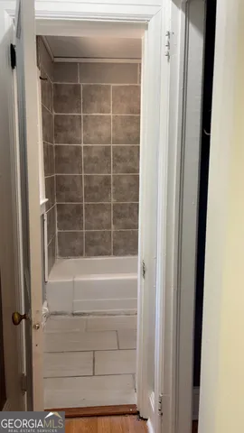 a bathroom with a bathtub