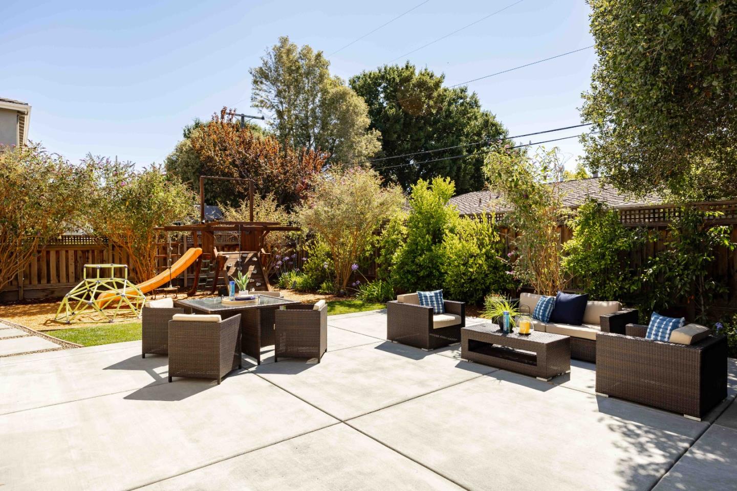 1400 Marigold Court Mountain View, CA 94040 - Photo 23 of 24 a view of backyard with seating space and trees