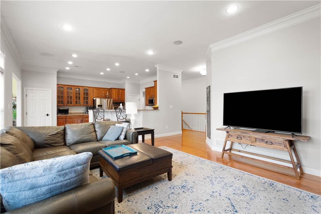 357 McMurray Road Pittsburgh, PA 15241 - Photo 14 of 46 a living room with furniture and a flat screen tv