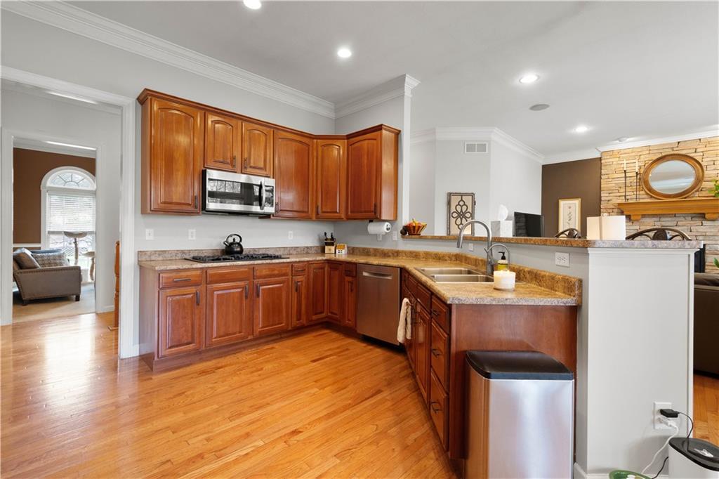 357 McMurray Road Pittsburgh, PA 15241 - Photo 16 of 46 a kitchen with a sink stove top oven and microwave