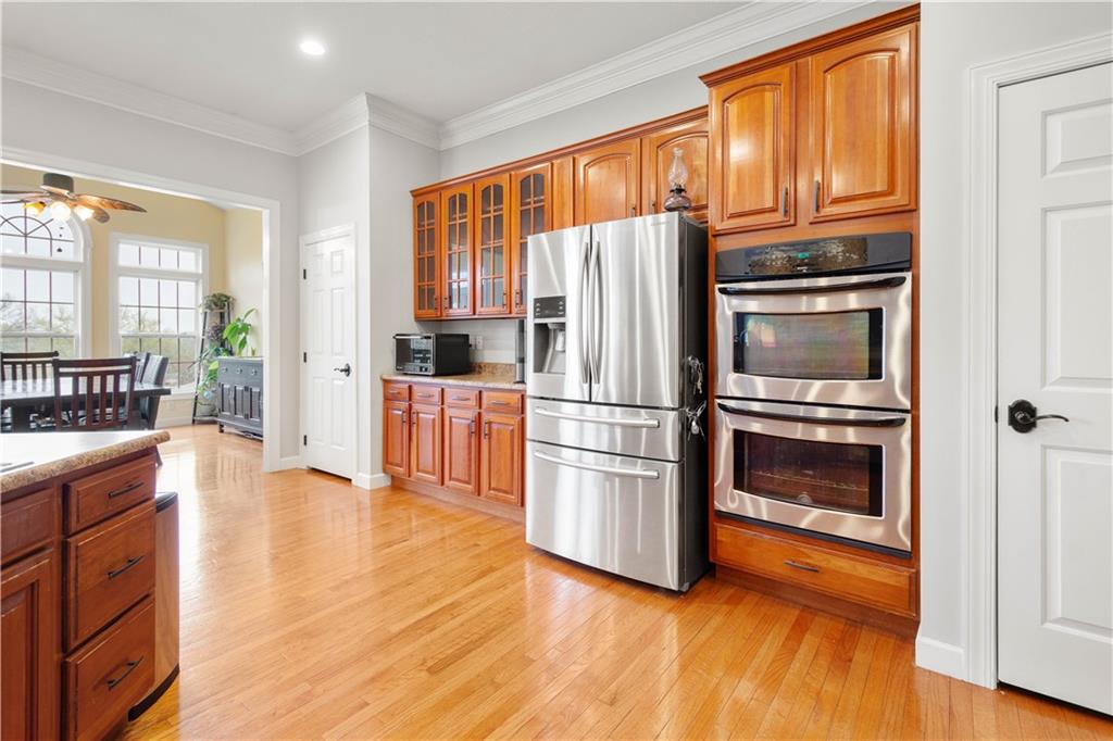 357 McMurray Road Pittsburgh, PA 15241 - Photo 17 of 46 a kitchen with granite countertop stainless steel appliances and wooden cabinets