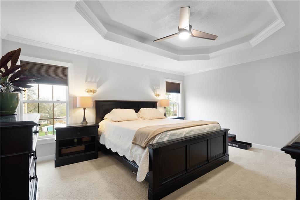 357 McMurray Road Pittsburgh, PA 15241 - Photo 20 of 46 a bedroom with a bed lamp and a fireplace