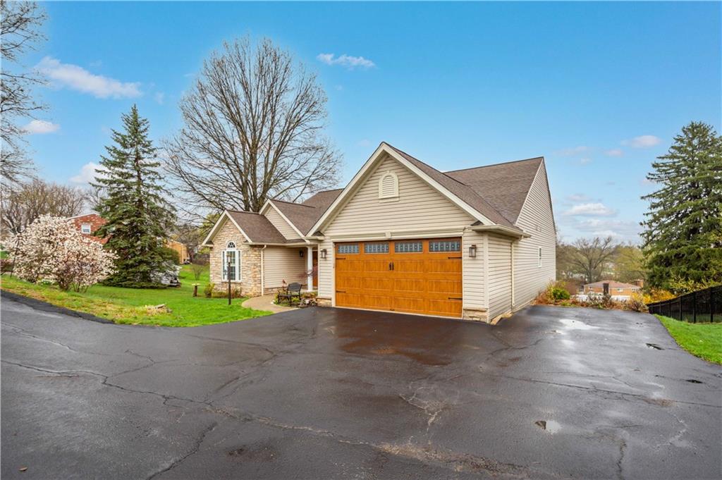 357 McMurray Road Pittsburgh, PA 15241 - Photo 2 of 46 a view of a house with a big yard and large trees