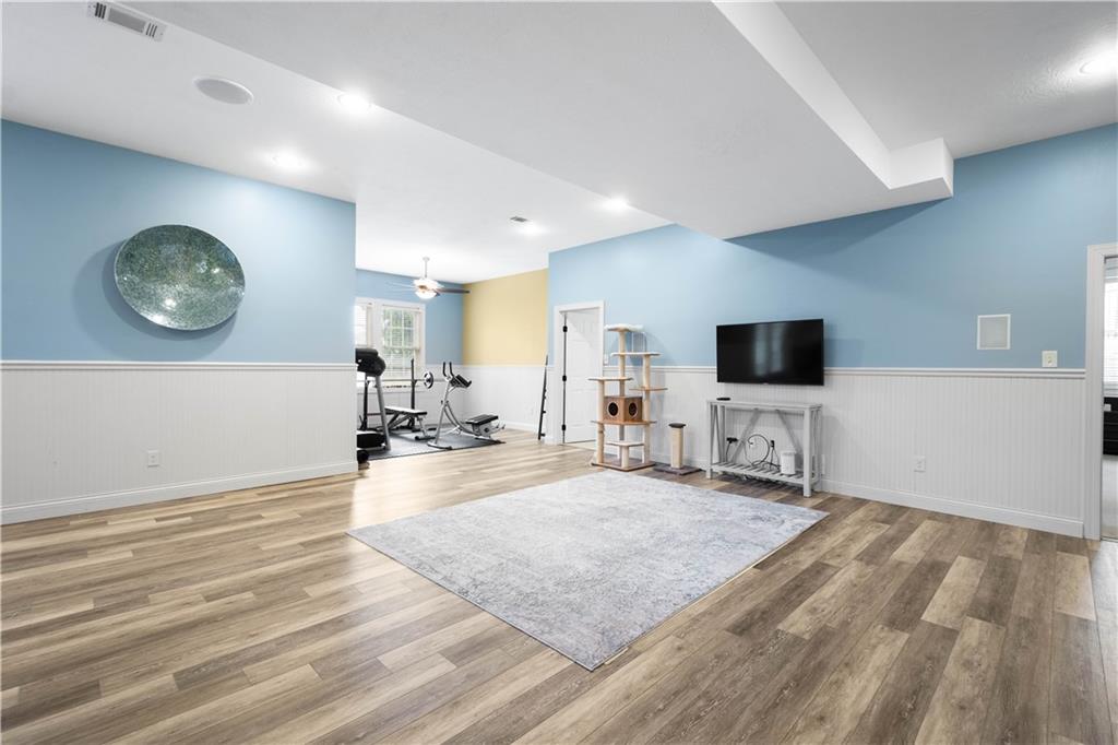 357 McMurray Road Pittsburgh, PA 15241 - Photo 25 of 46 a view of a livingroom with furniture and a flat screen tv