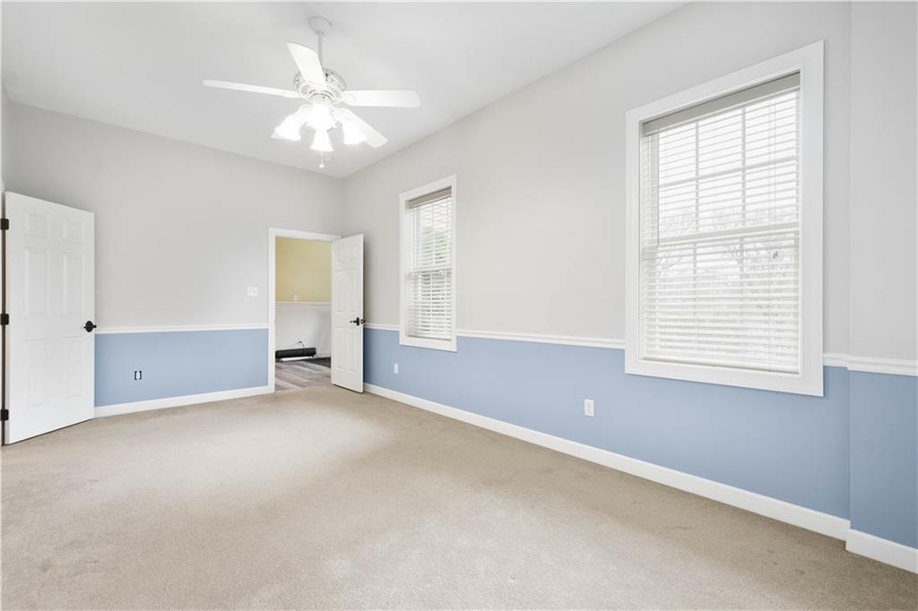 357 McMurray Road Pittsburgh, PA 15241 - Photo 31 of 46 an empty room with windows and chandelier fan