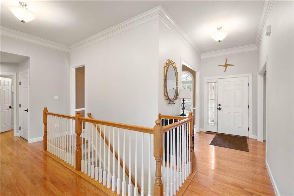 357 McMurray Road Pittsburgh, PA 15241 - Photo 4 of 46 a view of a hallway with wooden floor and stairs