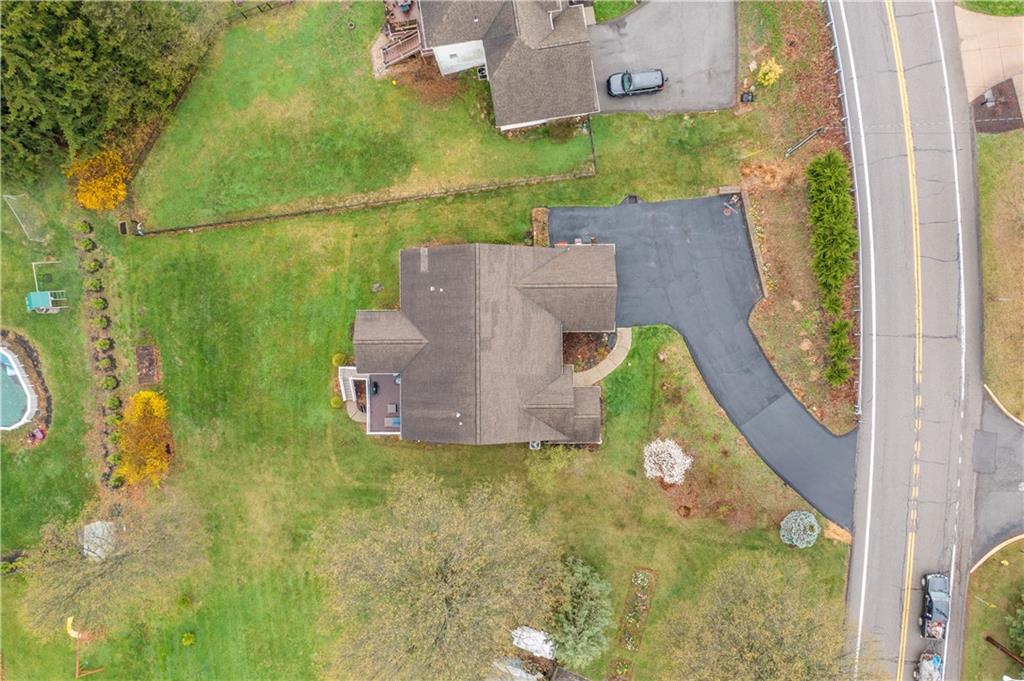 357 McMurray Road Pittsburgh, PA 15241 - Photo 42 of 46 an aerial view of a house with a garden and swimming pool