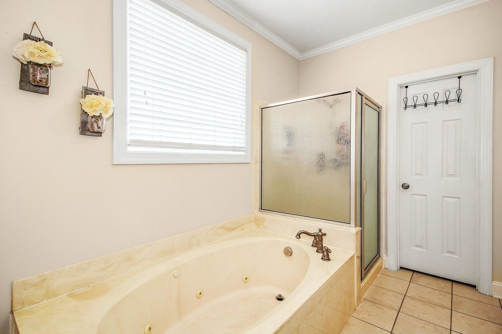 504 Averette Road Rolesville, NC 27571 - Photo 17 of 30 Master bathroom with separate tub and shower and lots of storage