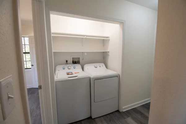 a utility room with dryer and washer