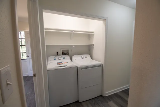 a utility room with dryer and washer