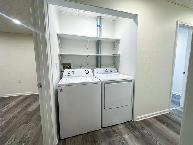 a utility room with dryer and washer