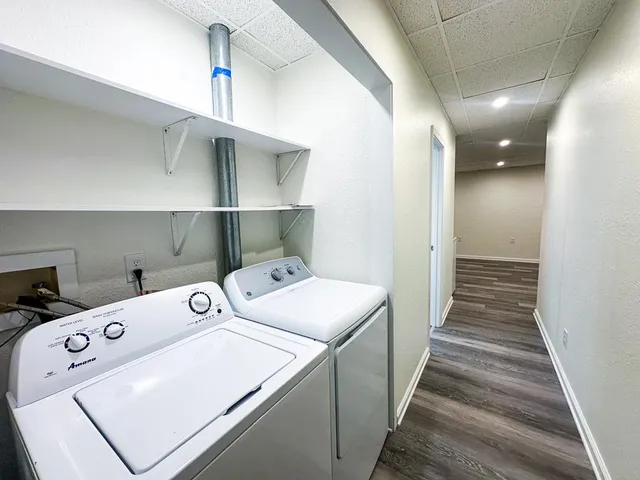 a utility room with dryer and washer