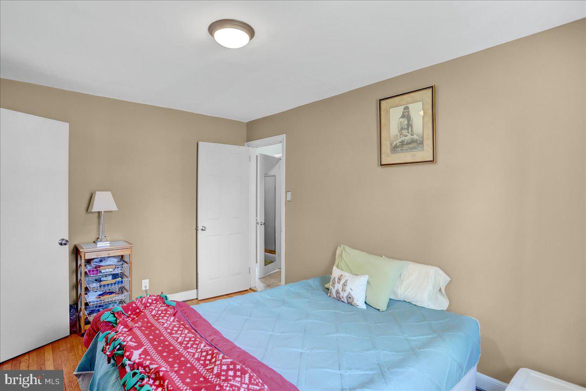 367 Waters Road York, PA 17403 - Photo 20 of 31 a bedroom with a bed and lamp