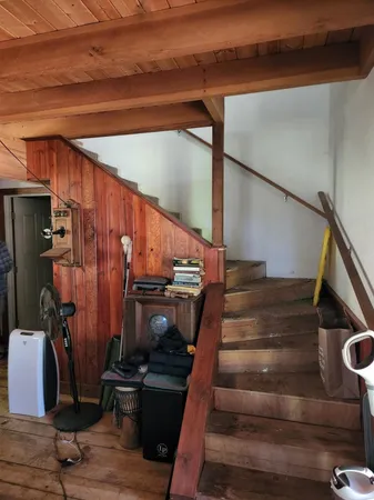 a view of entryway with wooden floor