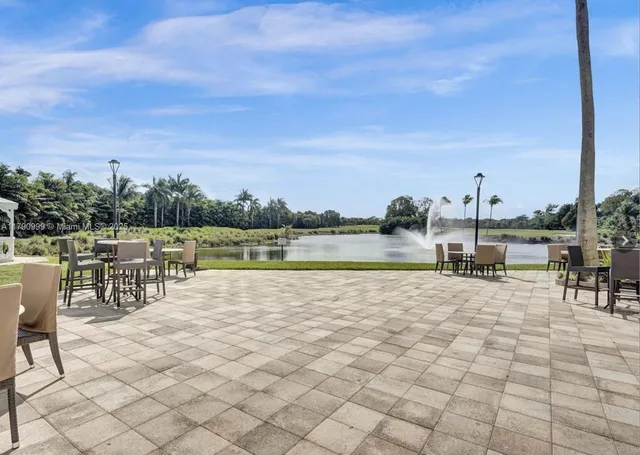 a view of a terrace with chairs