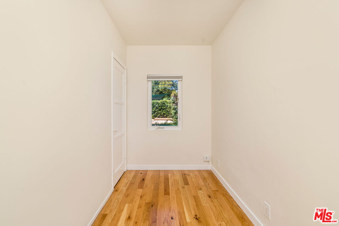 1215 North Avon Street Burbank, CA 91505 - Photo 18 of 37 a view of empty room with wooden floor