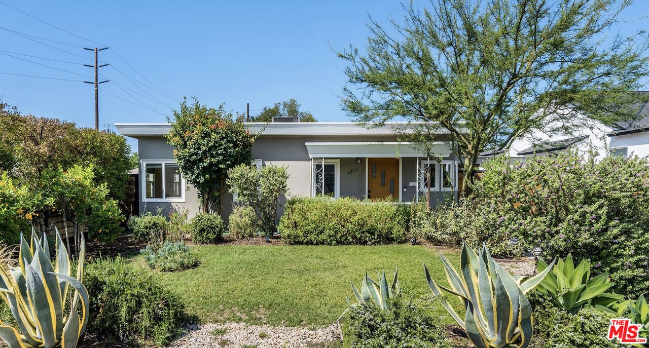 1215 North Avon Street Burbank, CA 91505 - Photo 2 of 37 a view of a house with garden and plants