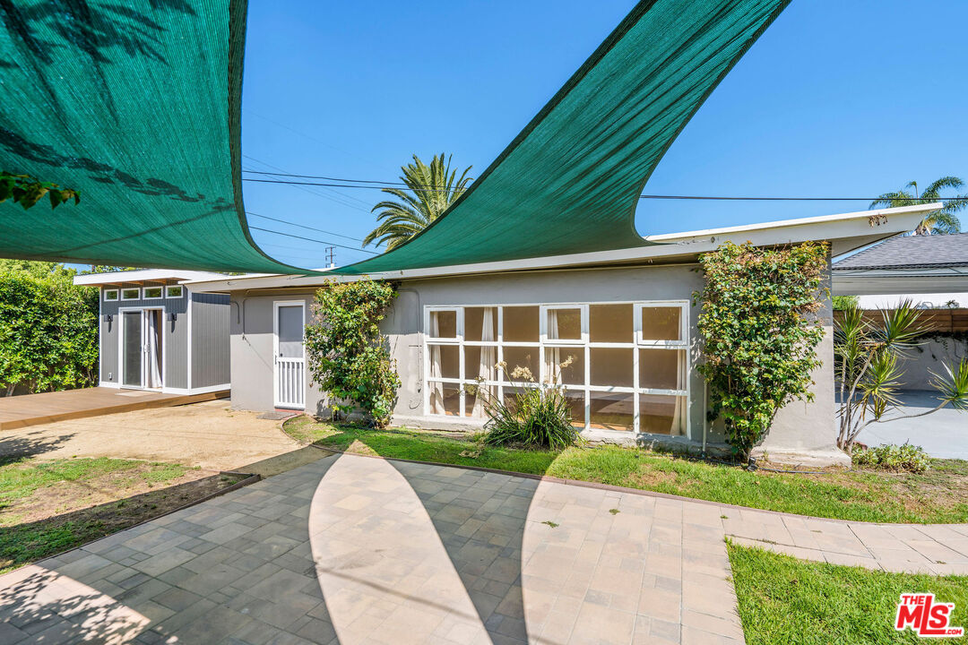 1215 North Avon Street Burbank, CA 91505 - Photo 23 of 37 front view of a house with a yard