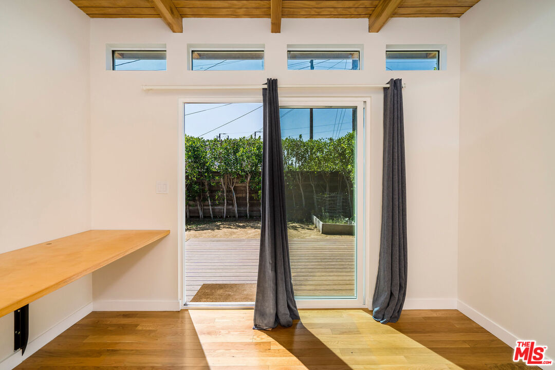 1215 North Avon Street Burbank, CA 91505 - Photo 30 of 37 a bathroom with a tub and shower