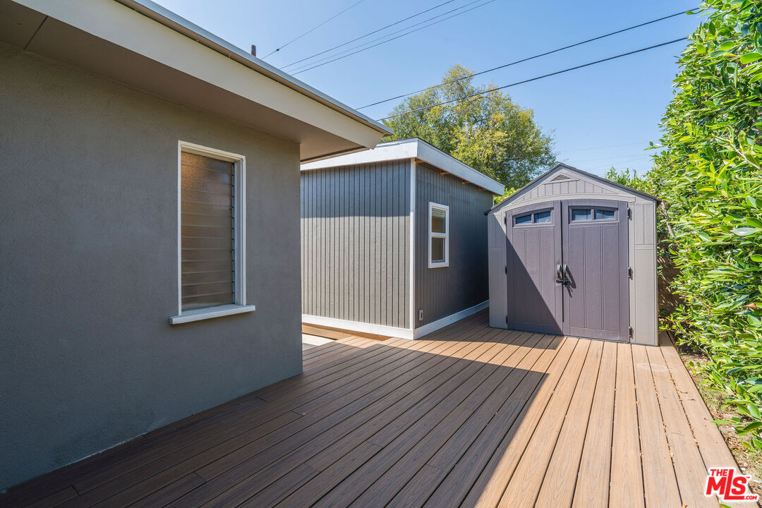 1215 North Avon Street Burbank, CA 91505 - Photo 33 of 37 a front view of a house with a garden