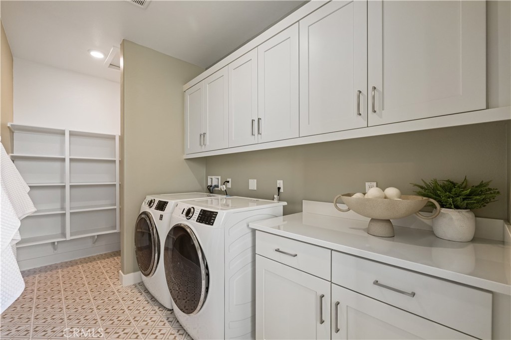 109 Trask Irvine, CA 92618 - Photo 10 of 25 a utility room with sink dryer and washer