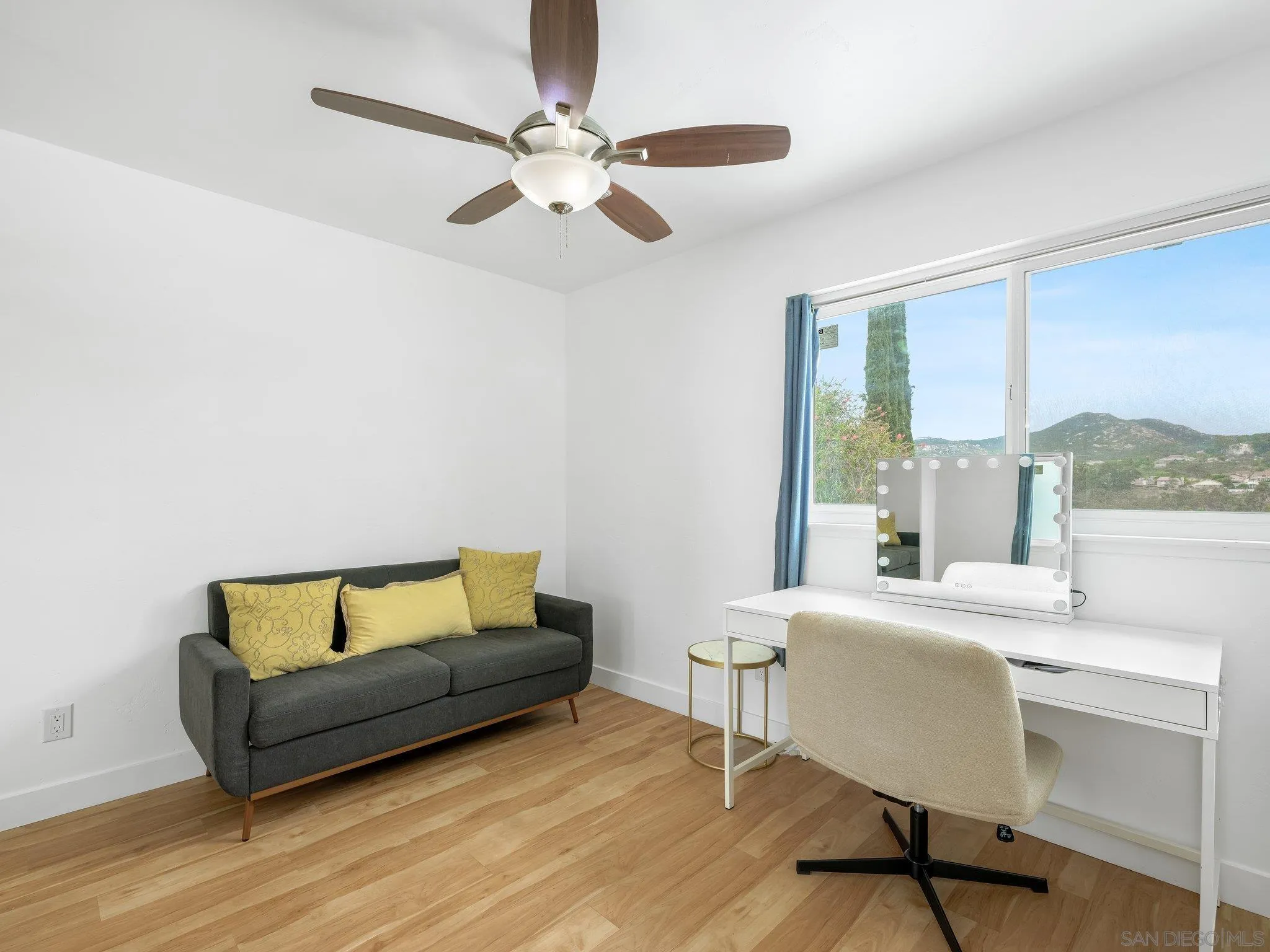 14813 Morningside Drive Poway, CA 92064 - Photo 30 of 37 a living room with furniture and a large window