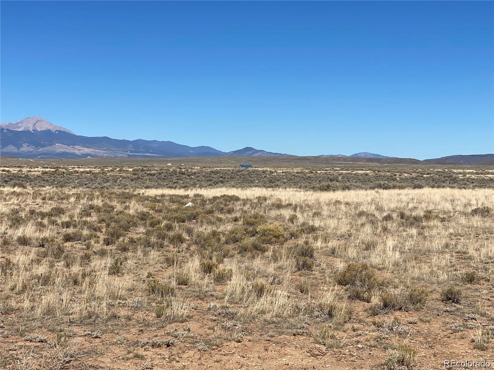 Apache Place San Luis, CO 81152 - Photo 7 of 7 a view of an lake and a mountain