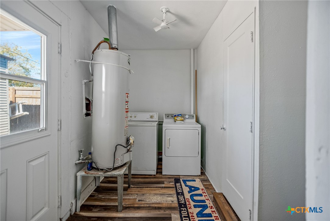 101 Lubbock Street Point Comfort, TX 77979 - Photo 14 of 34 a room with storage and utility