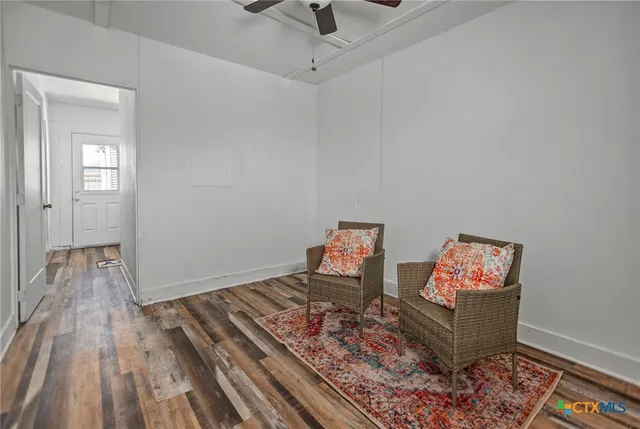 a kitchen with a stove and a refrigerator