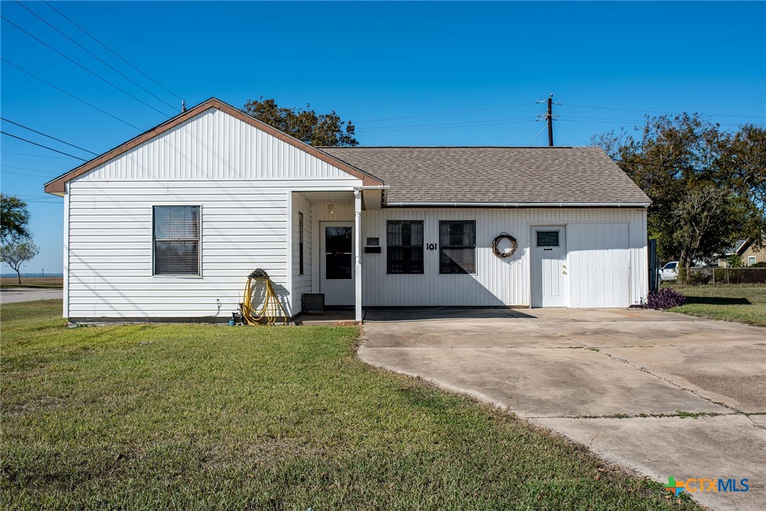 101 Lubbock Street Point Comfort, TX 77979 - Photo 2 of 34 a view of a house with backyard