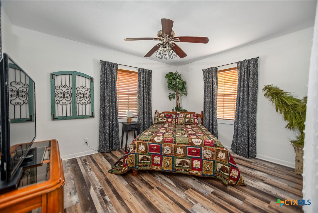 101 Lubbock Street Point Comfort, TX 77979 - Photo 27 of 34 a bedroom with furniture and a window