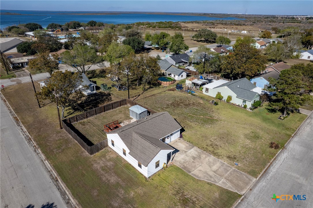 101 Lubbock Street Point Comfort, TX 77979 - Photo 31 of 34 an aerial view of residential houses with outdoor space