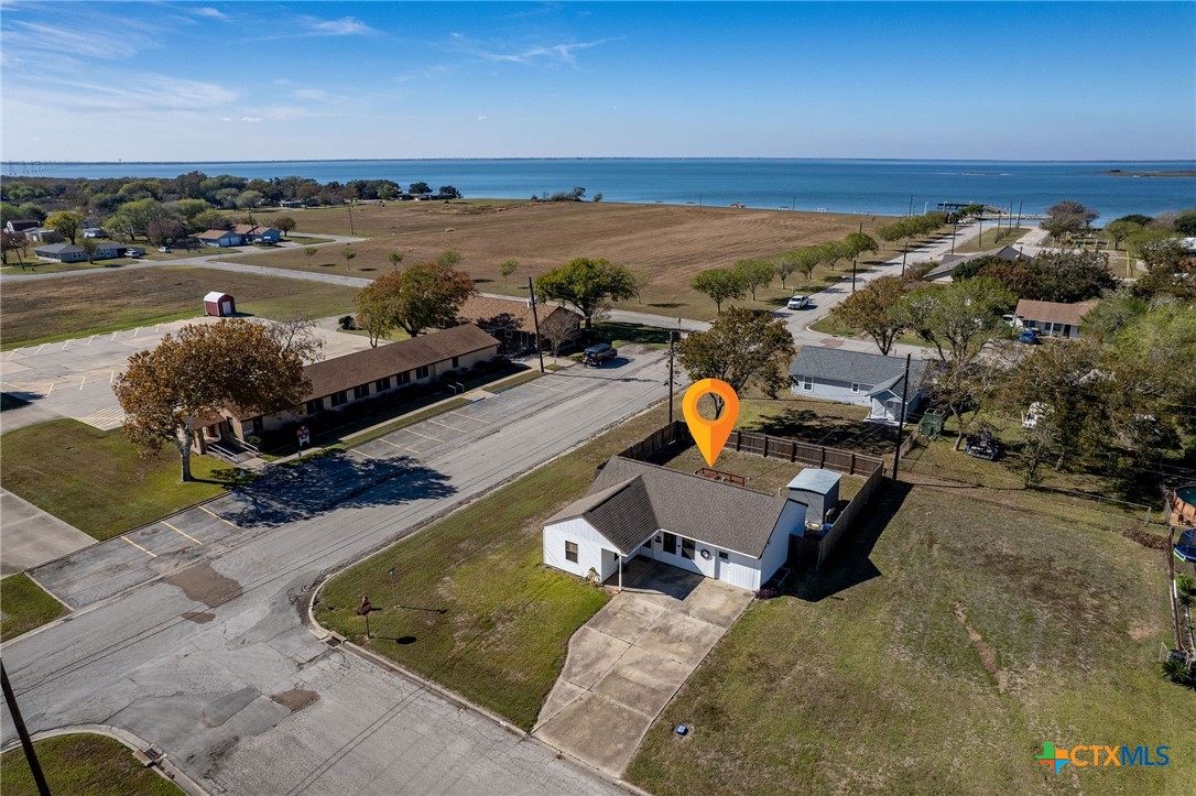101 Lubbock Street Point Comfort, TX 77979 - Photo 32 of 34 an aerial view of a house with yard swimming pool and ocean view