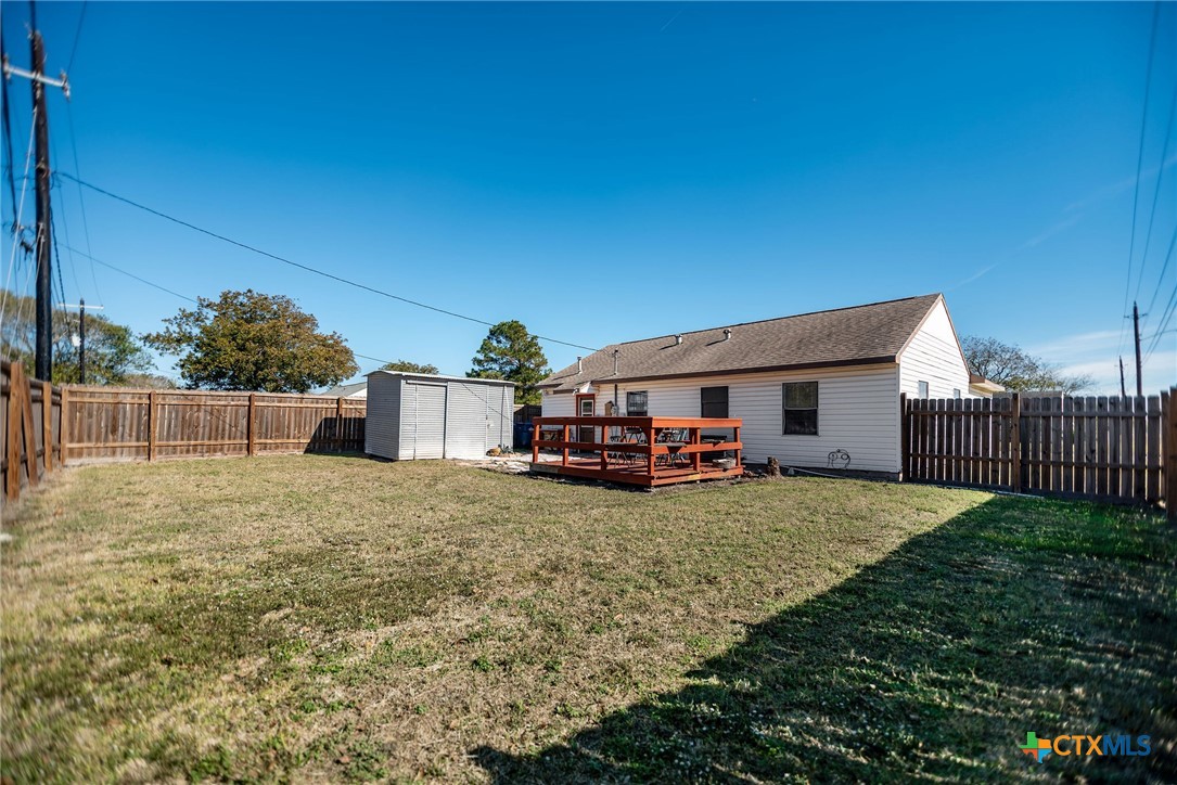 101 Lubbock Street Point Comfort, TX 77979 - Photo 5 of 34 a view of a house with backyard and porch