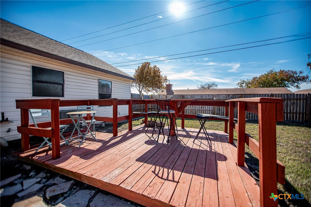 101 Lubbock Street Point Comfort, TX 77979 - Photo 6 of 34 a view of a patio with wooden floor