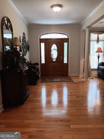 a white toilet sitting next to a shower curtain