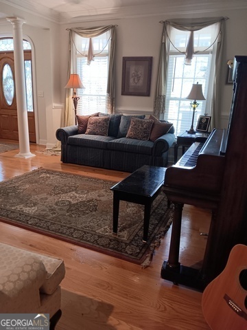 531 Grant Road Brooks, GA 30205 - Photo 16 of 96 a living room with furniture window and wooden floor