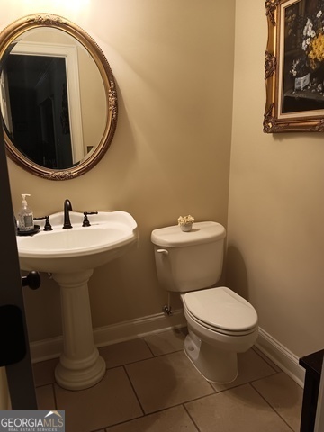 531 Grant Road Brooks, GA 30205 - Photo 29 of 96 a bathroom with a sink toilet and mirror