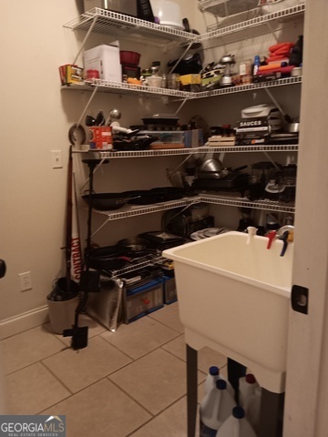 531 Grant Road Brooks, GA 30205 - Photo 31 of 96 a stove top oven sitting inside of a kitchen