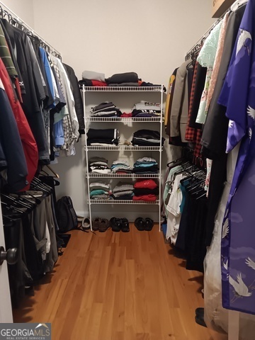 531 Grant Road Brooks, GA 30205 - Photo 38 of 96 a view of walk in closet with clothes and shoes